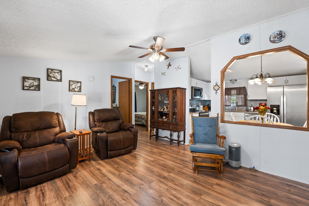 39 Red Bush School Road Blue Ridge, GA 30513 - Photo 17 of 36 a living room with furniture and wooden floor