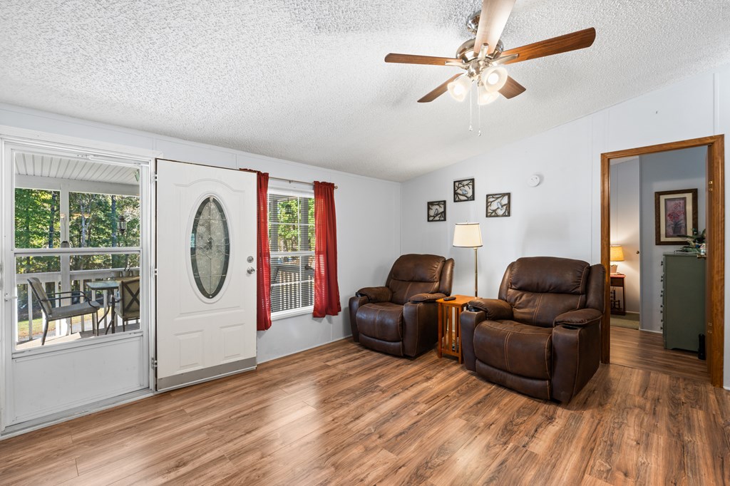 39 Red Bush School Road Blue Ridge, GA 30513 - Photo 19 of 36 a living room with furniture and a window