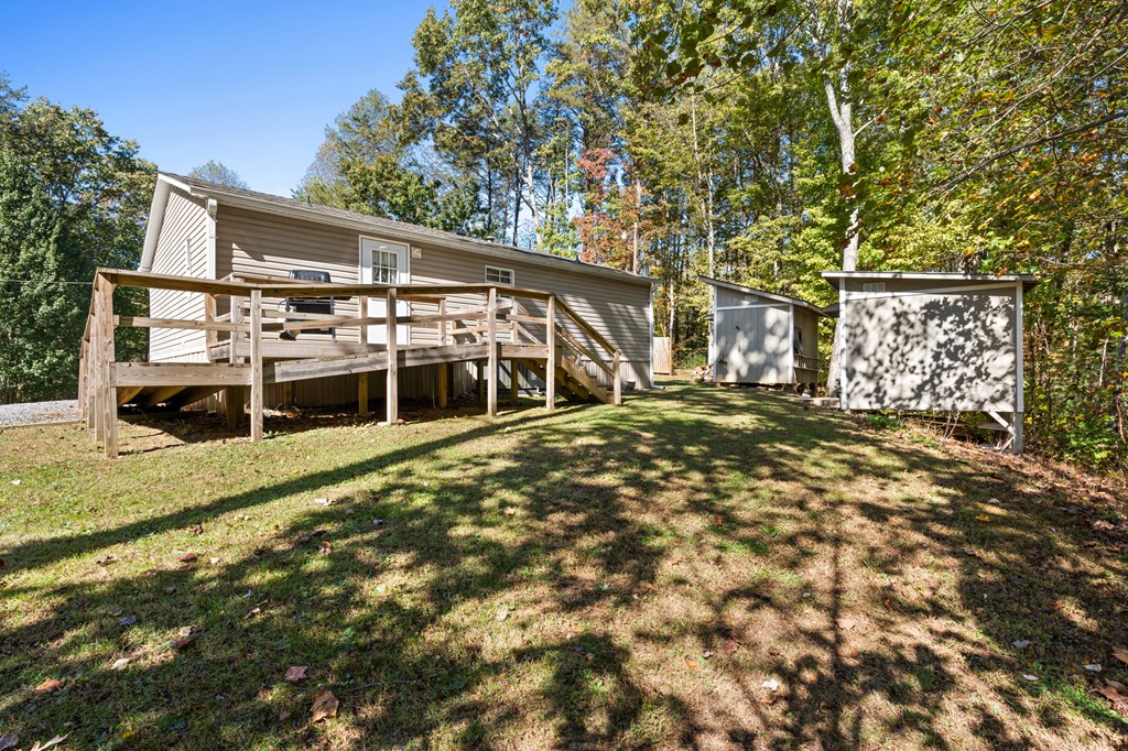 39 Red Bush School Road Blue Ridge, GA 30513 - Photo 9 of 36 front view of a house with a yard