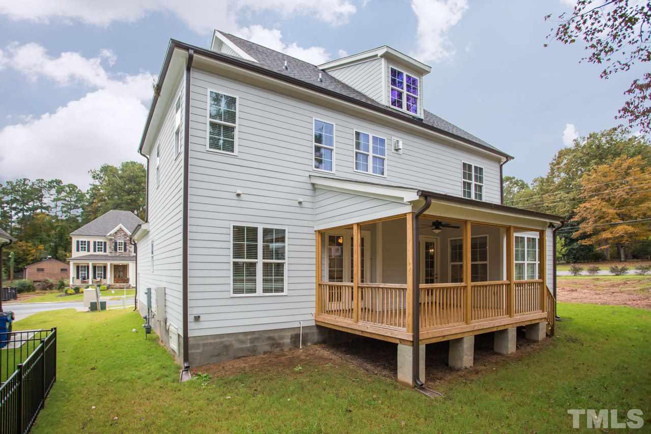 4612 Pleasant Pointe Way Raleigh, NC 27613 - Photo 2 of 25 a view of a house with a yard