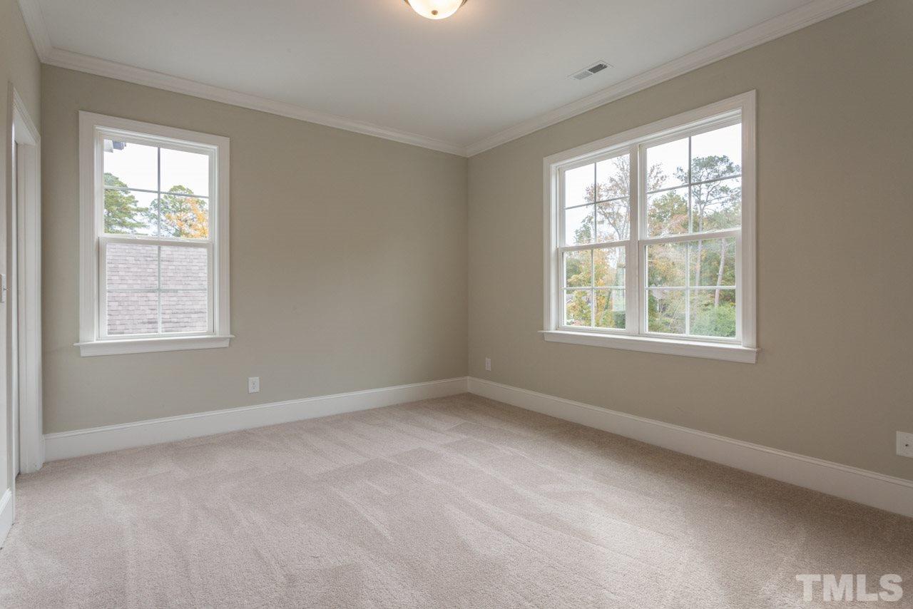 4612 Pleasant Pointe Way Raleigh, NC 27613 - Photo 19 of 25 an empty room with windows