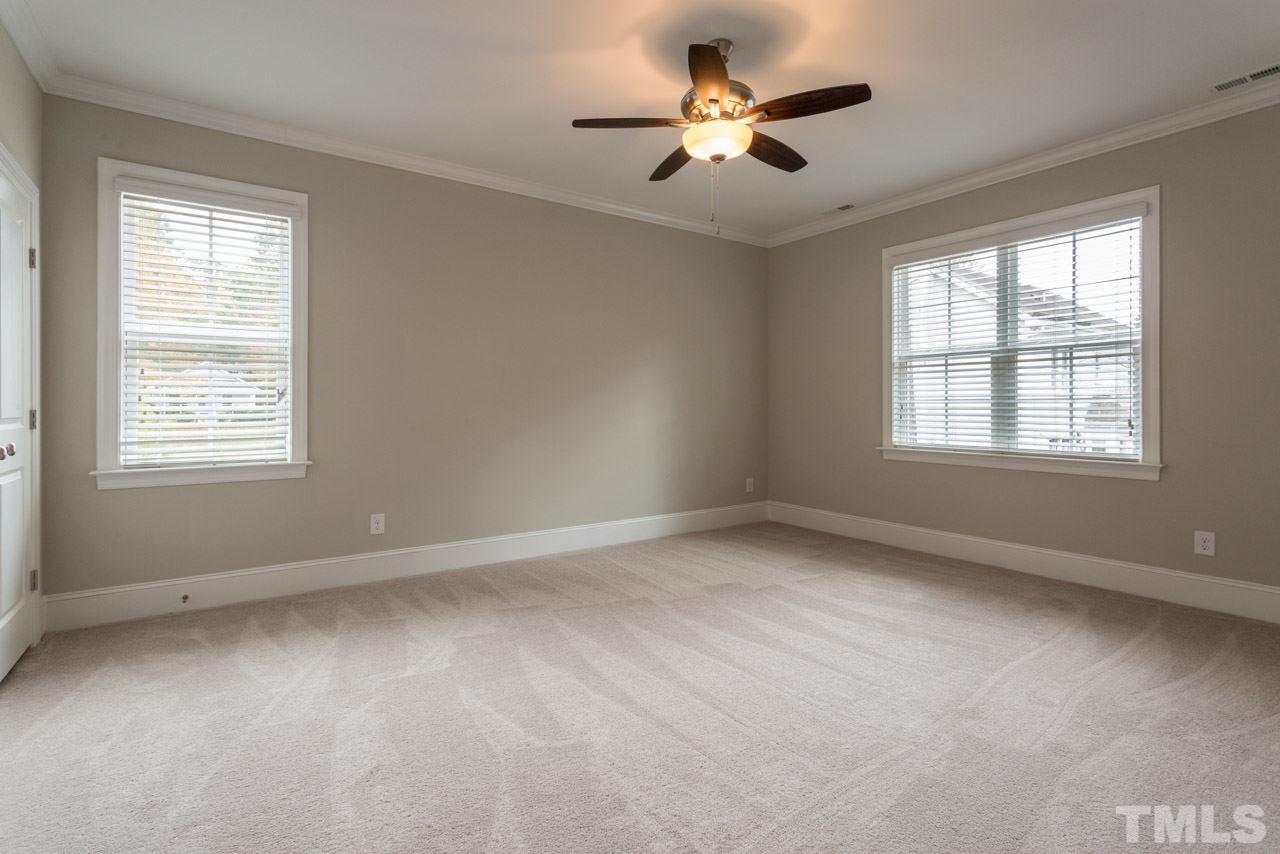 4612 Pleasant Pointe Way Raleigh, NC 27613 - Photo 20 of 25 a view of an empty room with a window