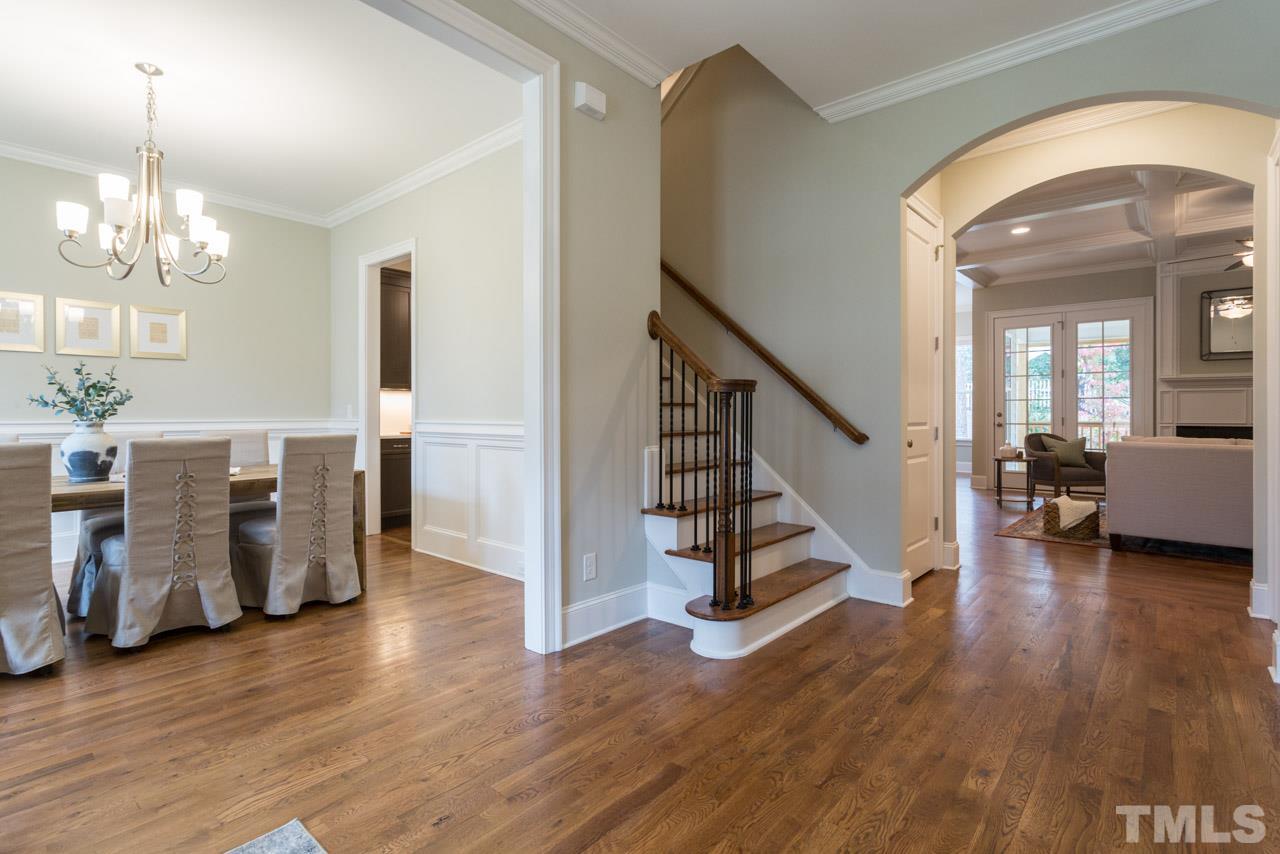 4612 Pleasant Pointe Way Raleigh, NC 27613 - Photo 3 of 25 a view of a livingroom with lots of furniture and wooden floor
