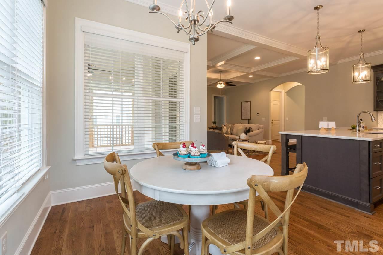 4612 Pleasant Pointe Way Raleigh, NC 27613 - Photo 8 of 25 a view of a dining room with furniture window and outside view