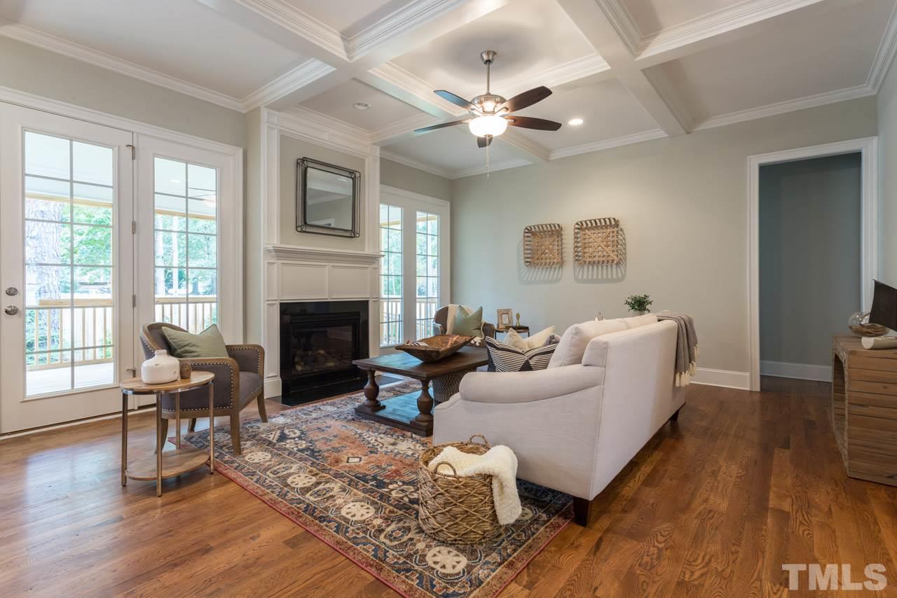 4612 Pleasant Pointe Way Raleigh, NC 27613 - Photo 10 of 25 a living room with furniture and a fireplace