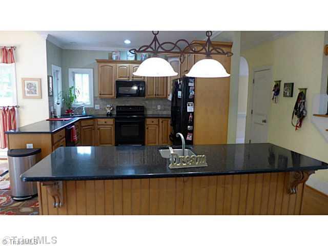 5406 Effieham Street Oak Ridge, NC 27310 - Photo 6 of 16 Kitchen.