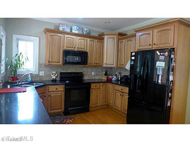 5406 Effieham Street Oak Ridge, NC 27310 - Photo 7 of 16 Kitchen.