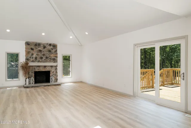 a kitchen with stainless steel appliances a refrigerator stove and microwave