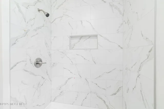 a view of a living room and dining room