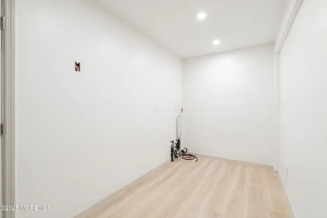 a view of staircase with white walls and white walls