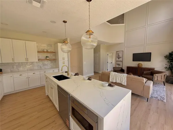 a white bath tub sitting in a bathroom