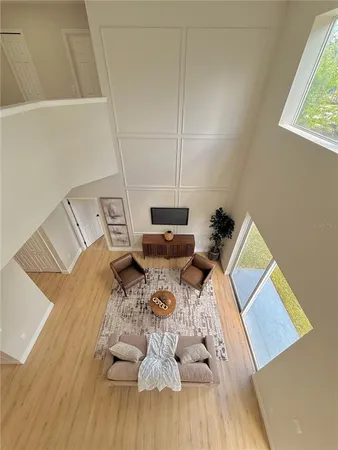 a white toilet sitting next to a white sink