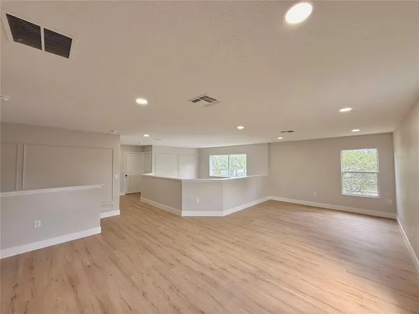 a view of a room with racks on the wall