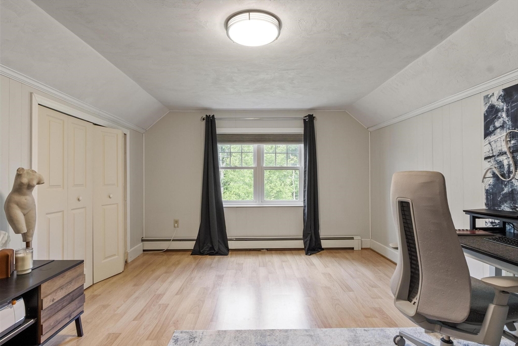 167 Gates Pond Road Berlin, MA 01503 - Photo 27 of 32 a view of a livingroom with furniture and a window
