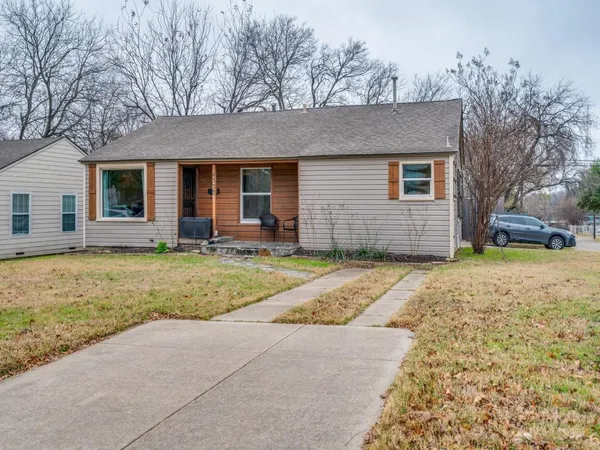 front view of a house with a yard