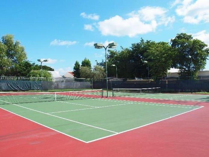 13814 Southwest 149th Cir Lane, Unit 362 Miami, FL 33186 - Photo 18 of 19 a view of a tennis court