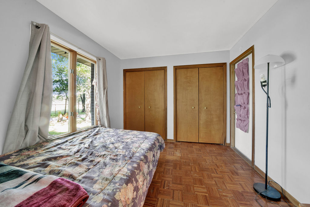7245 West Dralle Road Monee, IL 60449 - Photo 16 of 73 a bedroom with a bed and a window
