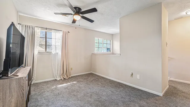 a view of a livingroom with a flat screen tv