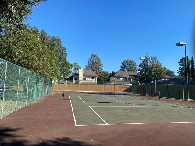 a picture of a bathroom with a bathtub