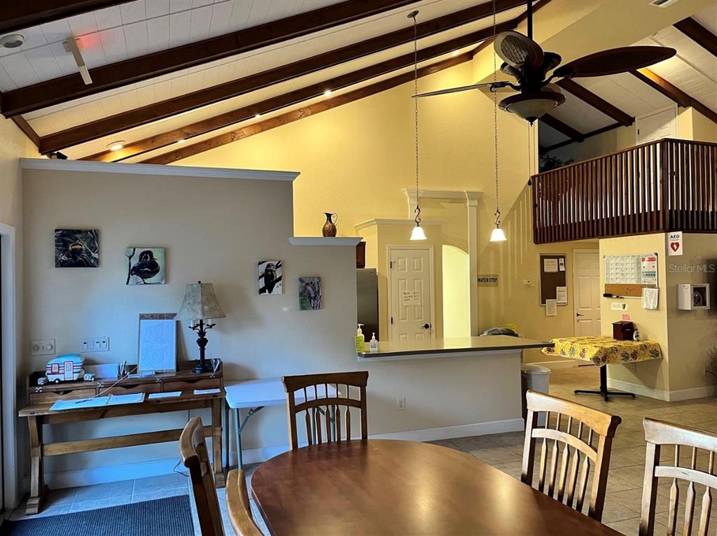 10264 Northeast 28th Loop Silver Springs, FL 34488 - Photo 17 of 44 a room with furniture and a table