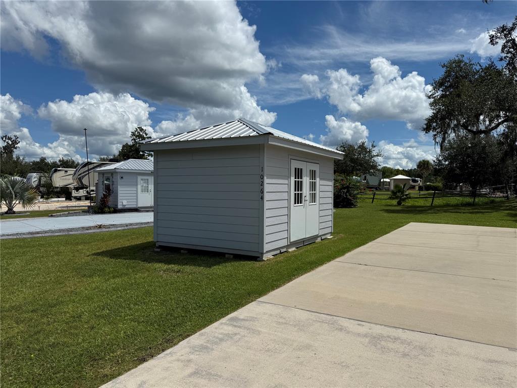 10264 Northeast 28th Loop Silver Springs, FL 34488 - Photo 6 of 44 a view of a house with a yard