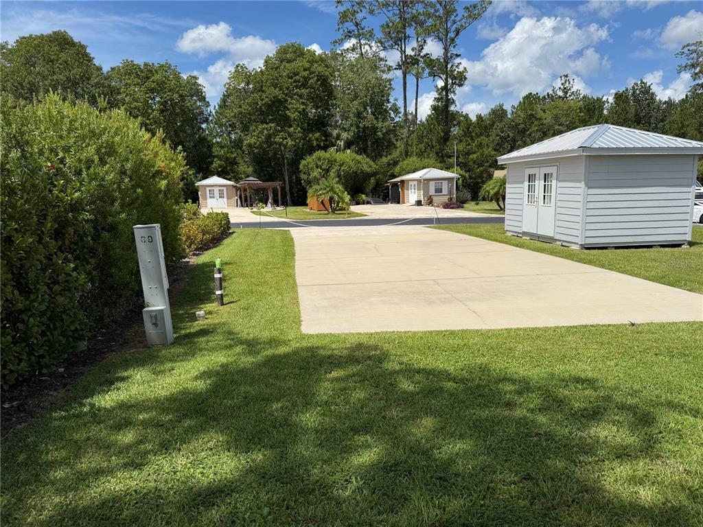 10264 Northeast 28th Loop Silver Springs, FL 34488 - Photo 8 of 44 a house view with a garden space