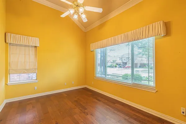 a view of a livingroom with wooden floor
