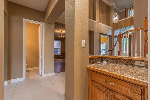 a kitchen with stainless steel appliances granite countertop a sink and cabinets