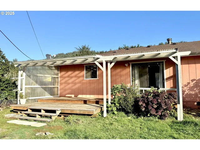 a kitchen with stainless steel appliances kitchen island granite countertop a sink and cabinets
