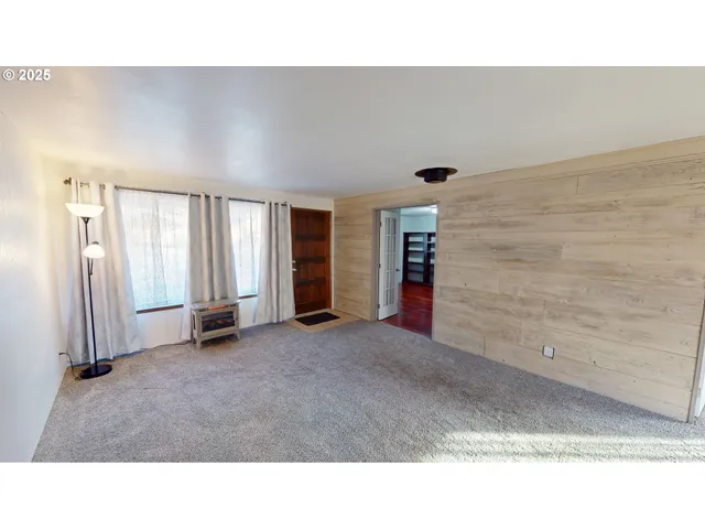 a living room with a couch and fireplace