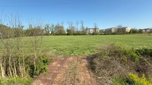 a view of a garden with an outdoor space
