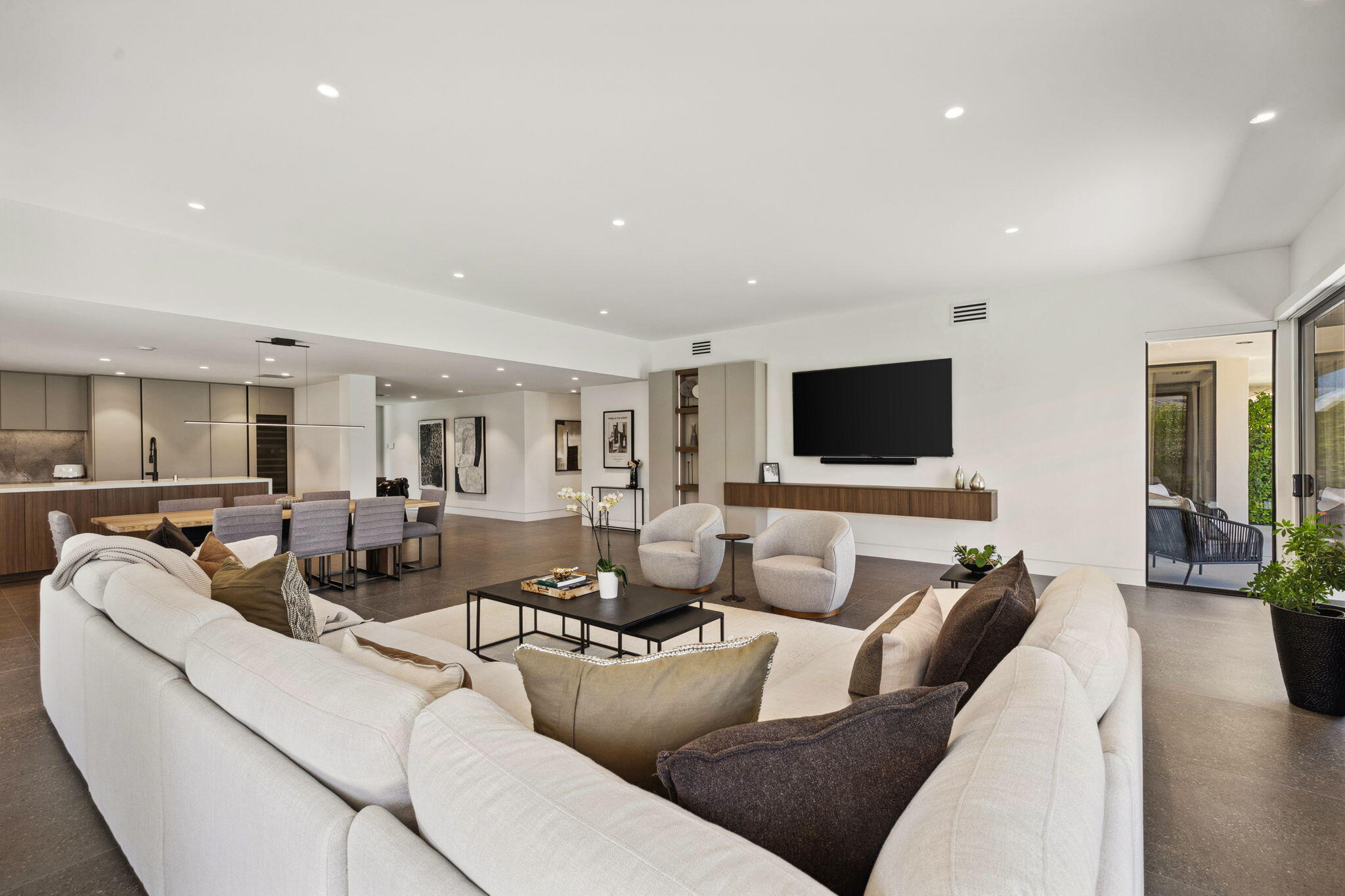 20 Lafayette Drive Rancho Mirage, CA 92270 - Photo 14 of 48 a living room with furniture and a flat screen tv