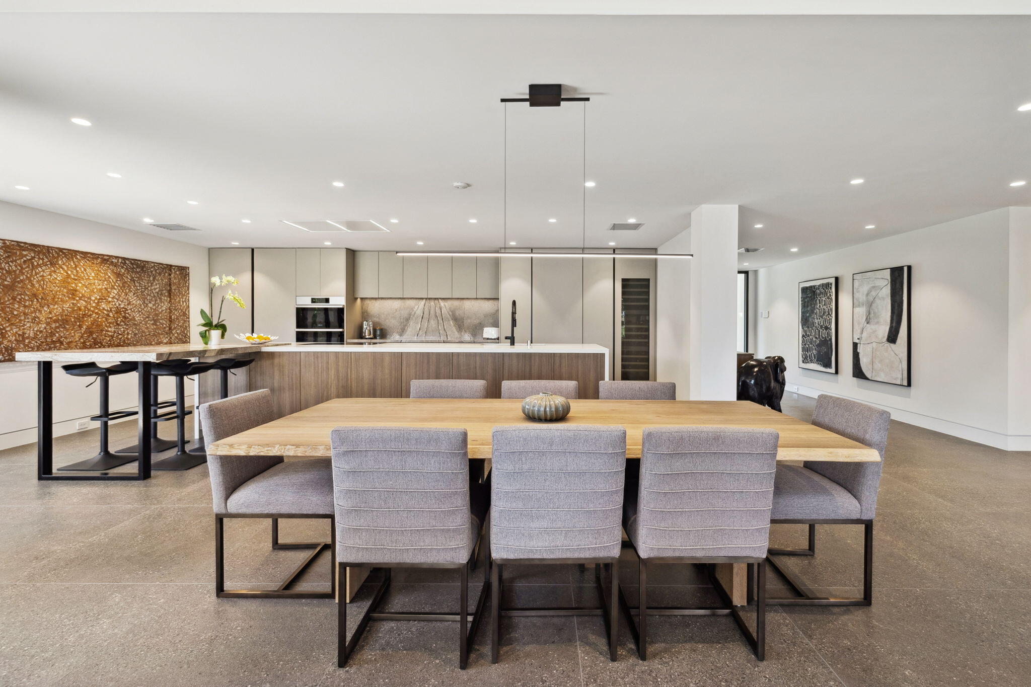 20 Lafayette Drive Rancho Mirage, CA 92270 - Photo 15 of 48 a large kitchen with a table and chairs