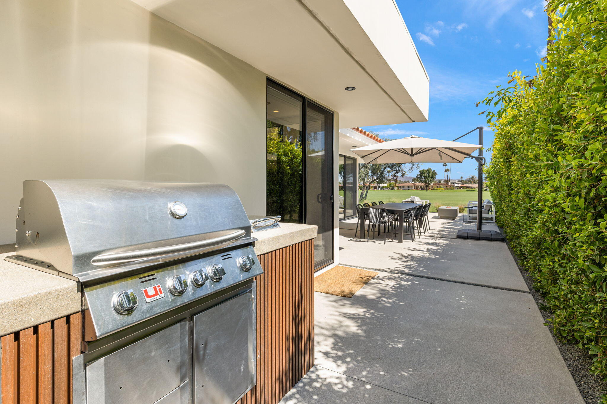20 Lafayette Drive Rancho Mirage, CA 92270 - Photo 40 of 48 a view of a patio with a table and chairs