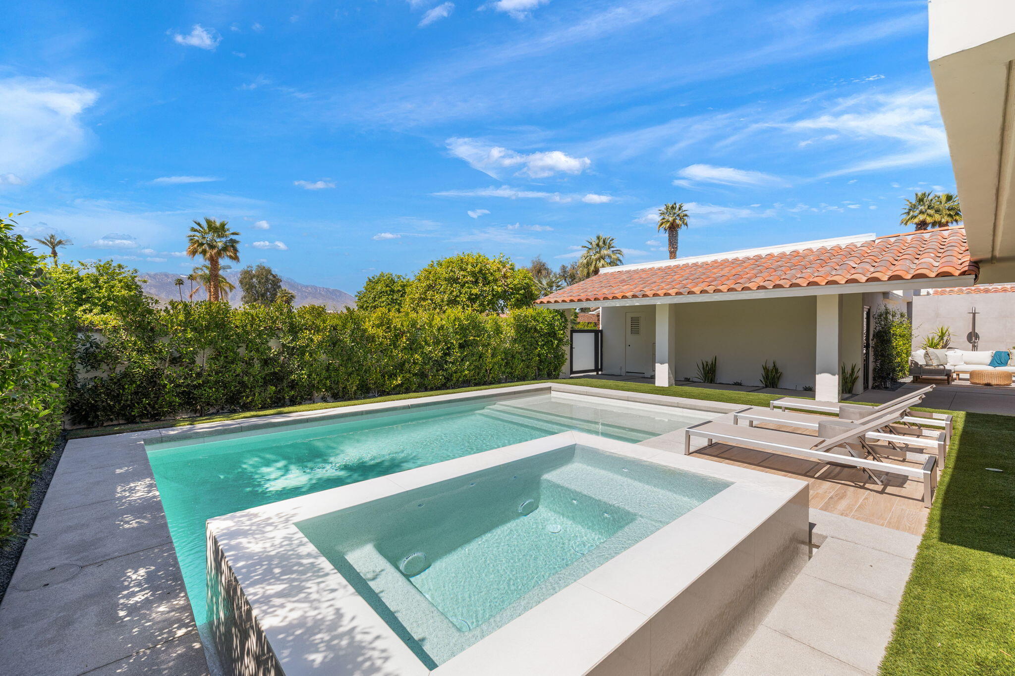 20 Lafayette Drive Rancho Mirage, CA 92270 - Photo 43 of 48 a view of a house with pool and a yard