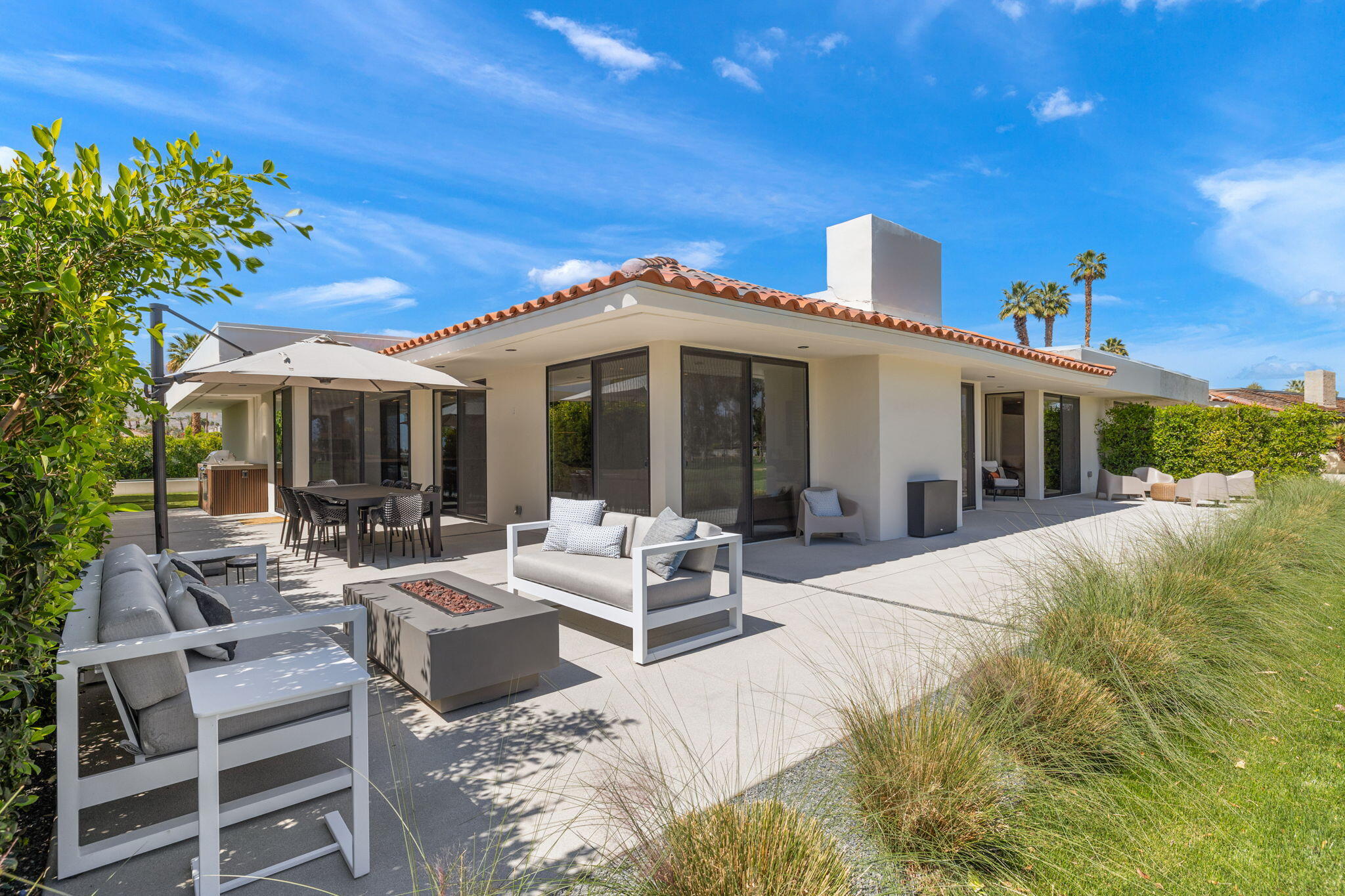20 Lafayette Drive Rancho Mirage, CA 92270 - Photo 46 of 48 a view of a house with backyard porch and sitting area