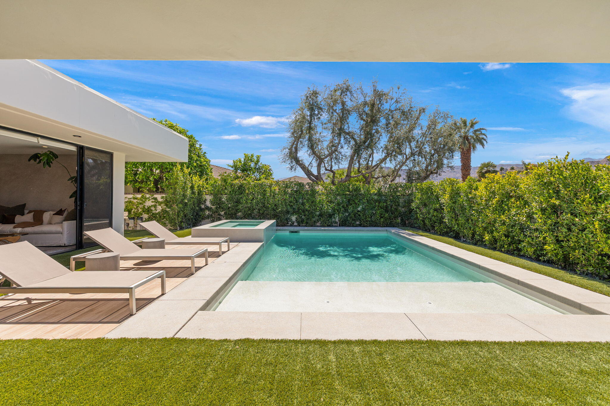 20 Lafayette Drive Rancho Mirage, CA 92270 - Photo 7 of 48 a view of backyard with swimming pool and outdoor seating