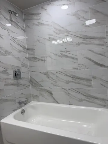 a bathroom with a bathtub