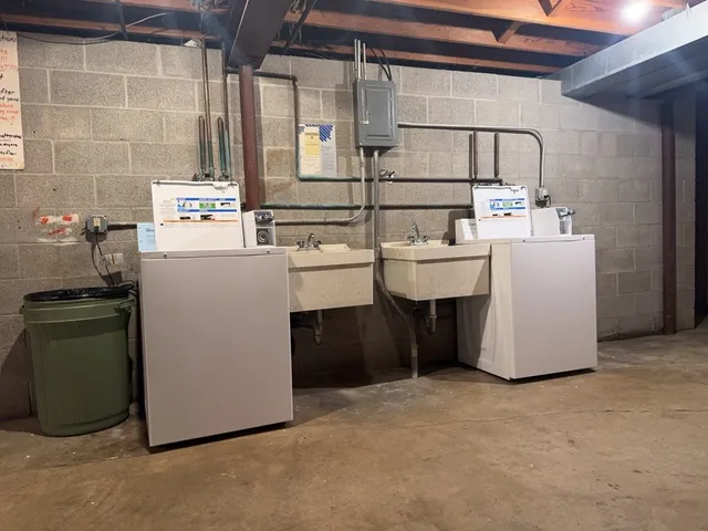 a utility room with dryer and washer