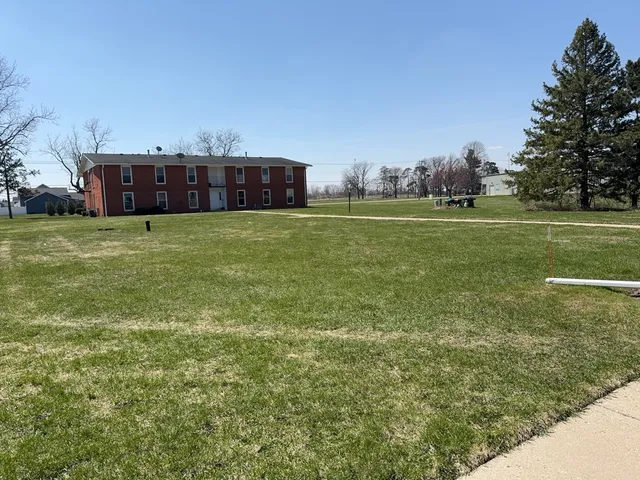 a view of a house with a big yard