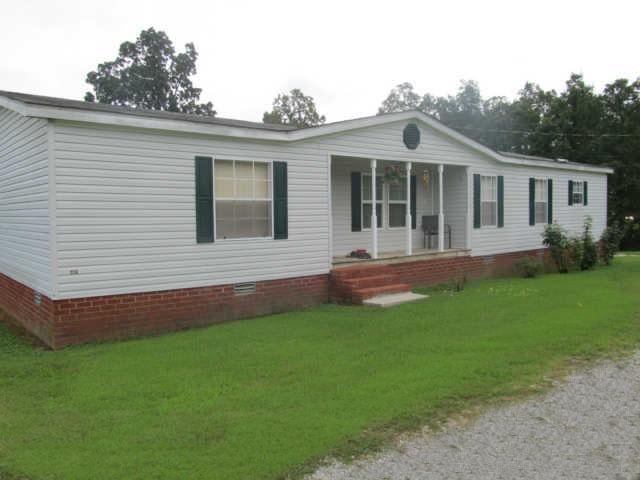 2188 CCC Road McEwen, TN 37101 - Photo 1 of 16 a front view of house with yard and green space
