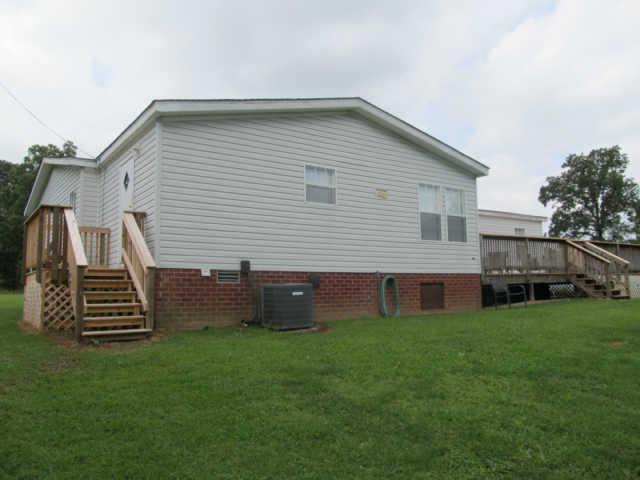 2188 CCC Road McEwen, TN 37101 - Photo 13 of 16 a front view of house with yard and green space
