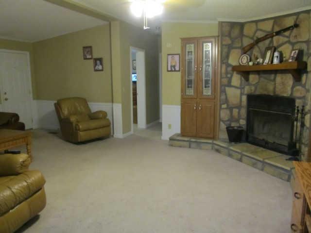 2188 CCC Road McEwen, TN 37101 - Photo 5 of 16 a living room with furniture and a fireplace