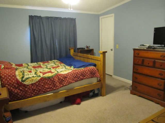2188 CCC Road McEwen, TN 37101 - Photo 6 of 16 a bedroom with a bed and furniture