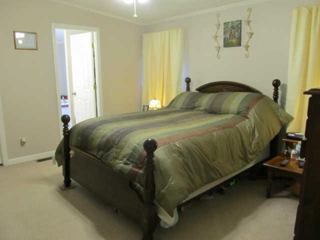 2188 CCC Road McEwen, TN 37101 - Photo 8 of 16 a bedroom with a bed and window