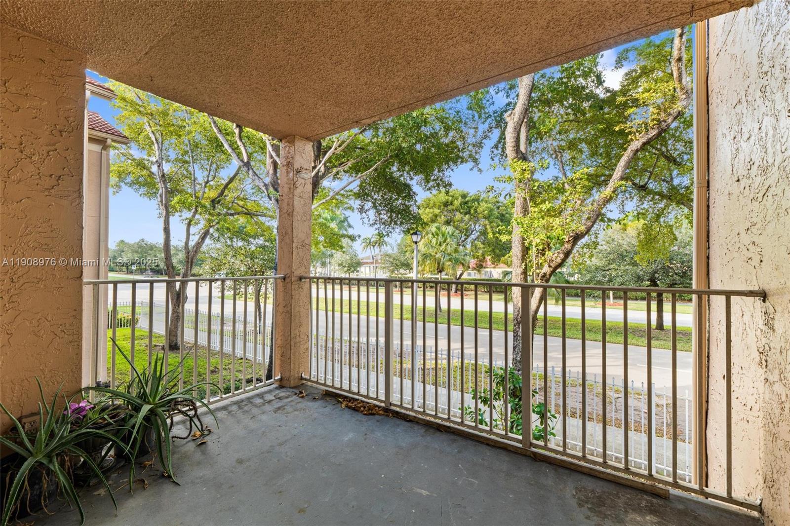 10421 Southwest 157th Place, Unit 206 Miami, FL 33196 - Photo 15 of 35 a view of a large window with an outdoor space