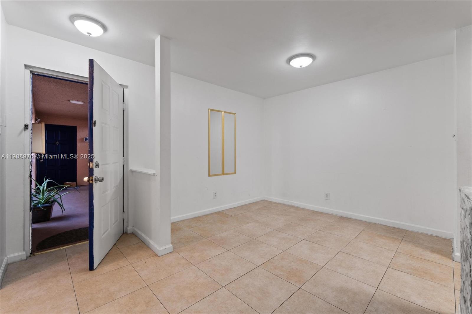 10421 Southwest 157th Place, Unit 206 Miami, FL 33196 - Photo 21 of 35 a view of an empty room and closet area