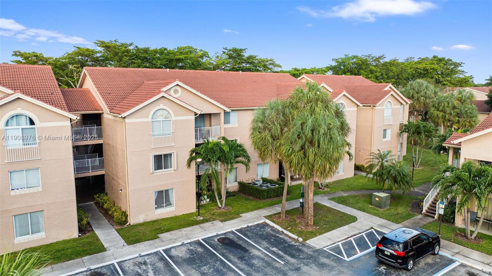 10421 Southwest 157th Place, Unit 206 Miami, FL 33196 - Photo 29 of 35 a aerial view of a house with a garden view