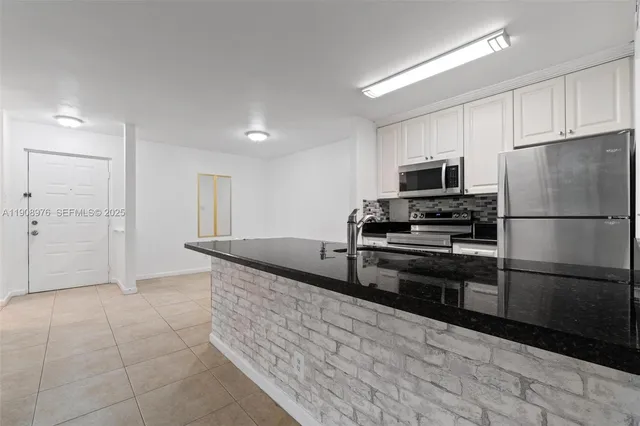 $295,000 | 10421 Southwest 157th Place, Unit 206, Miami, FL 33196