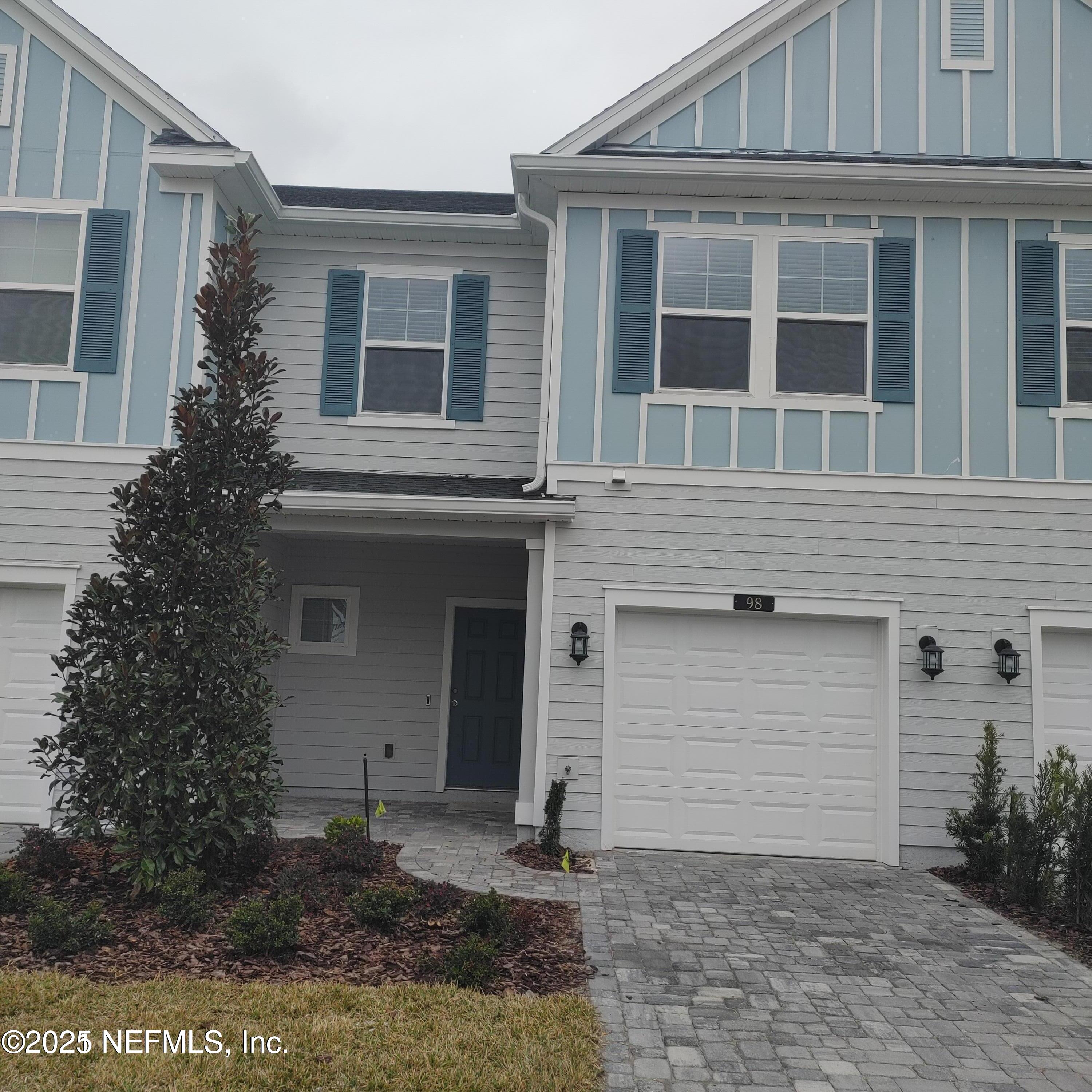 98 Boracay Circle St. Johns, FL 32259 - Photo 2 of 22 a front view of a house with garden